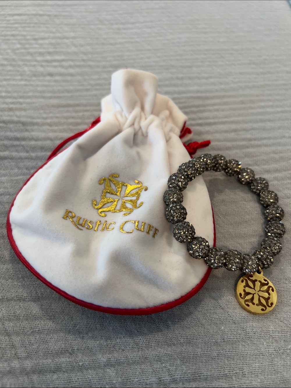 Rustic Cuff Silver Crystal Stretch Bracelet with Gold Logo Disc